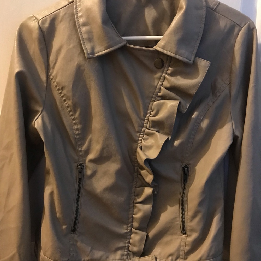Woman size small faux tan jacket.